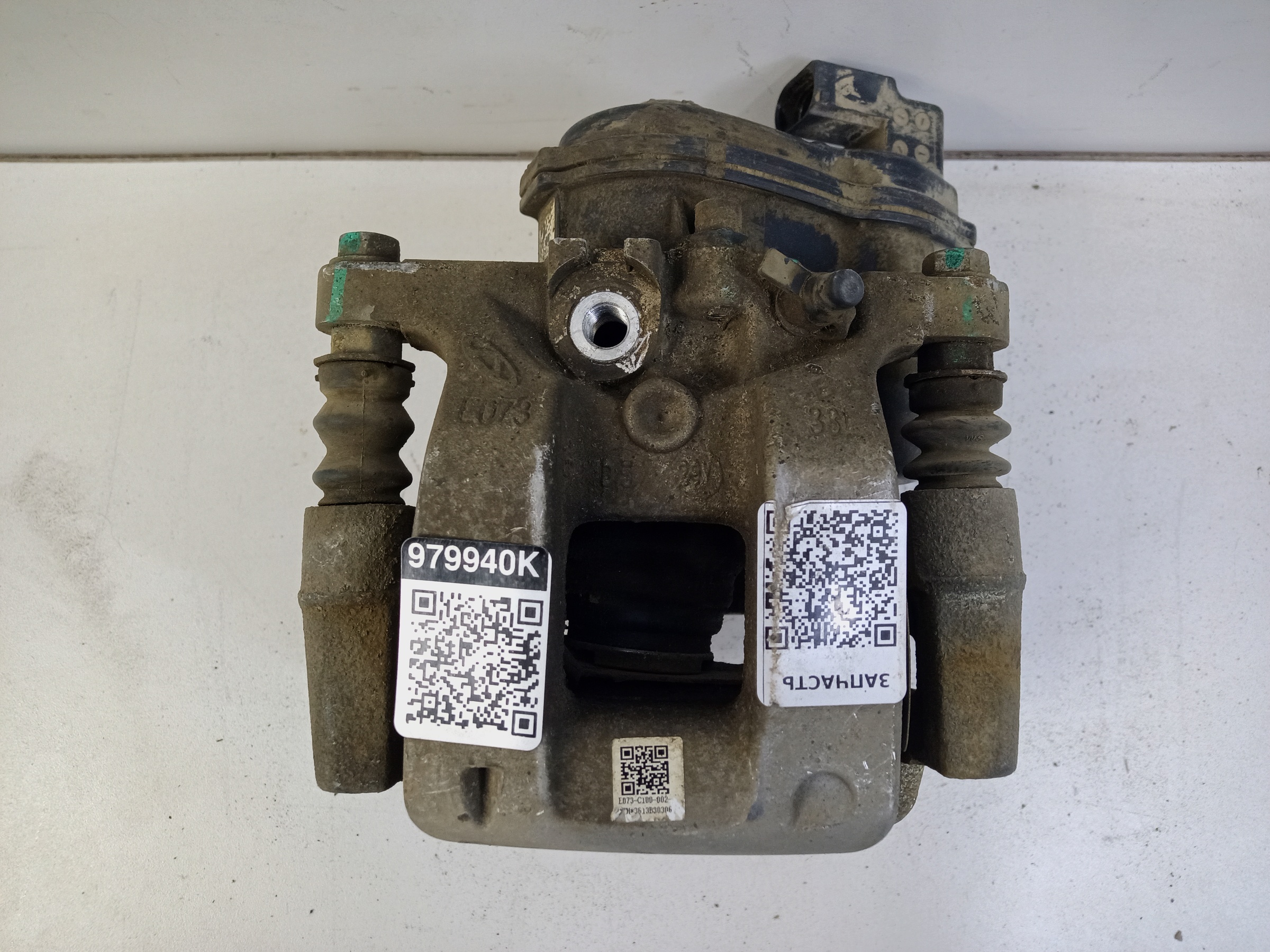 Суппорт тормозной задний левый Chery Tiggo 7 Pro