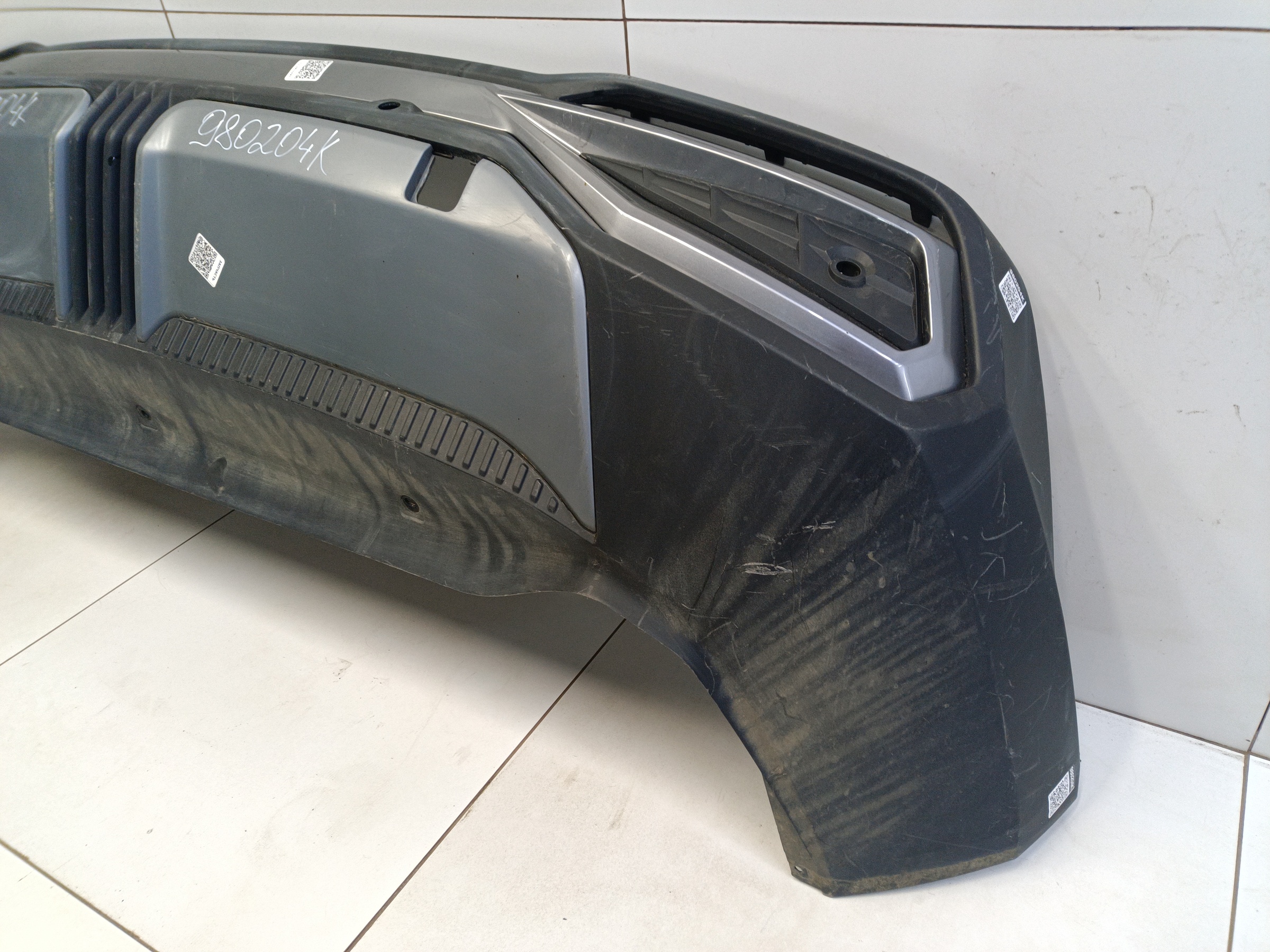 Юбка заднего бампера Geely Atlas 2