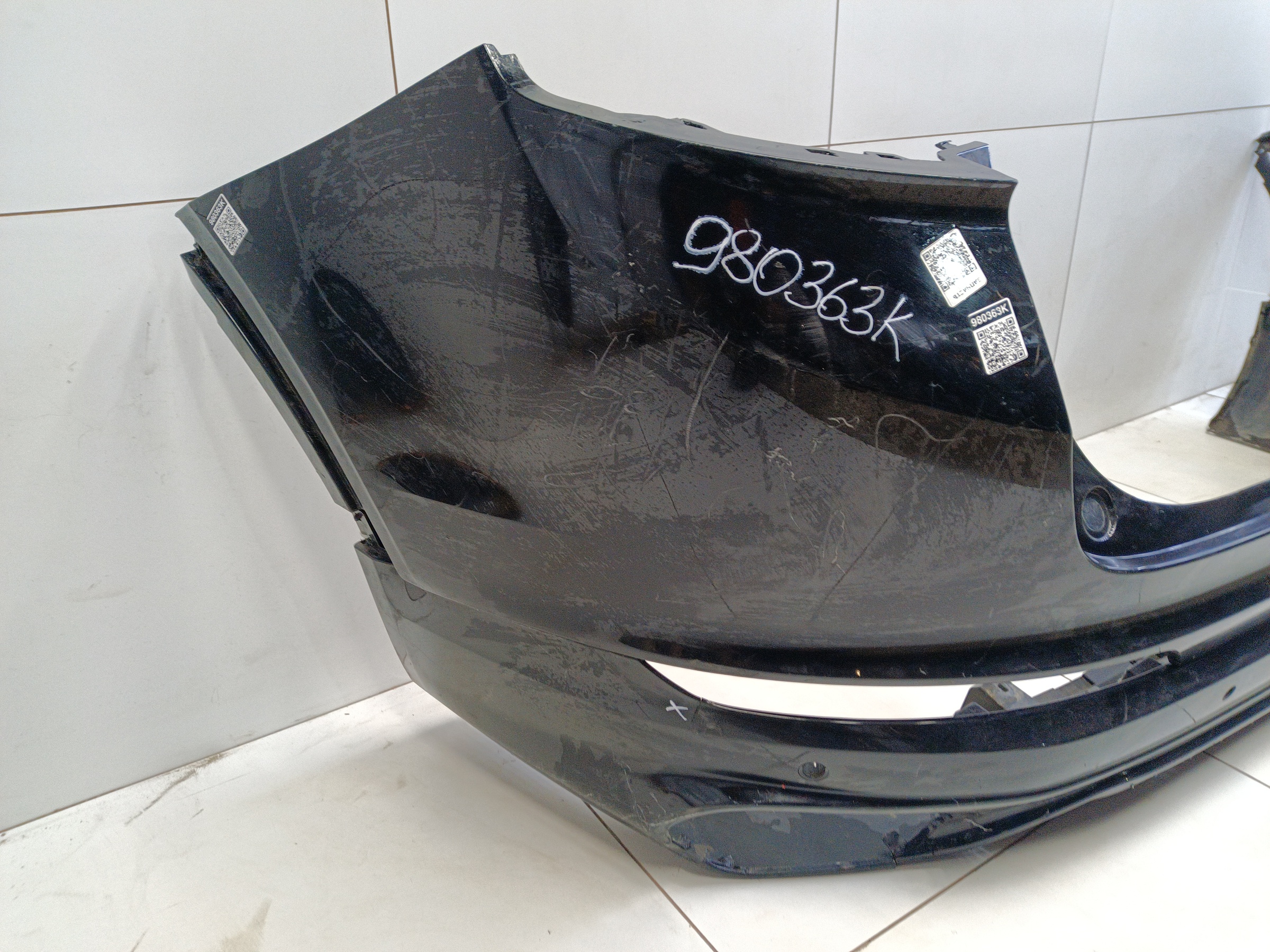 Бампер задний верхняя часть Geely Tugella