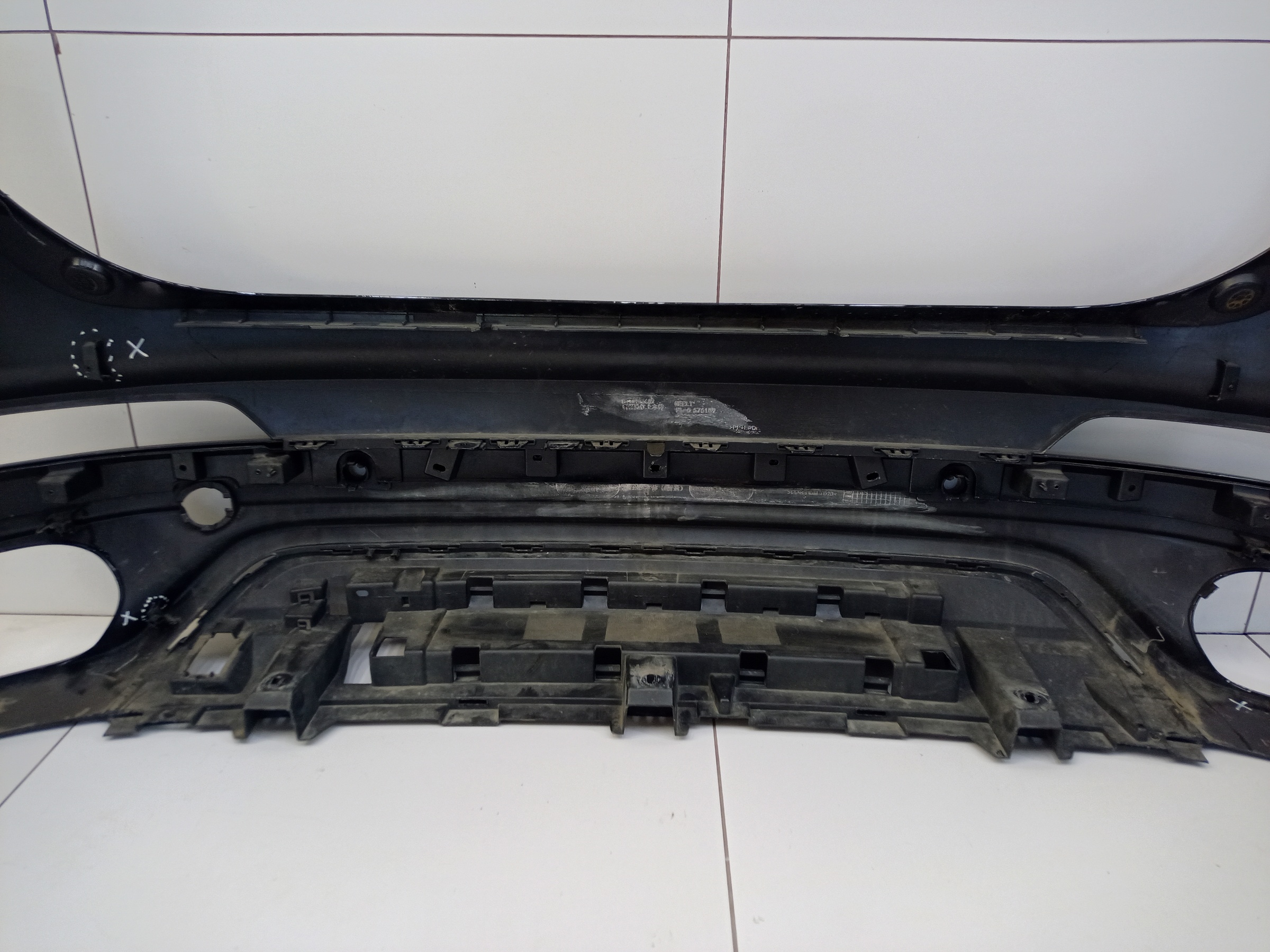 Бампер задний верхняя часть Geely Tugella