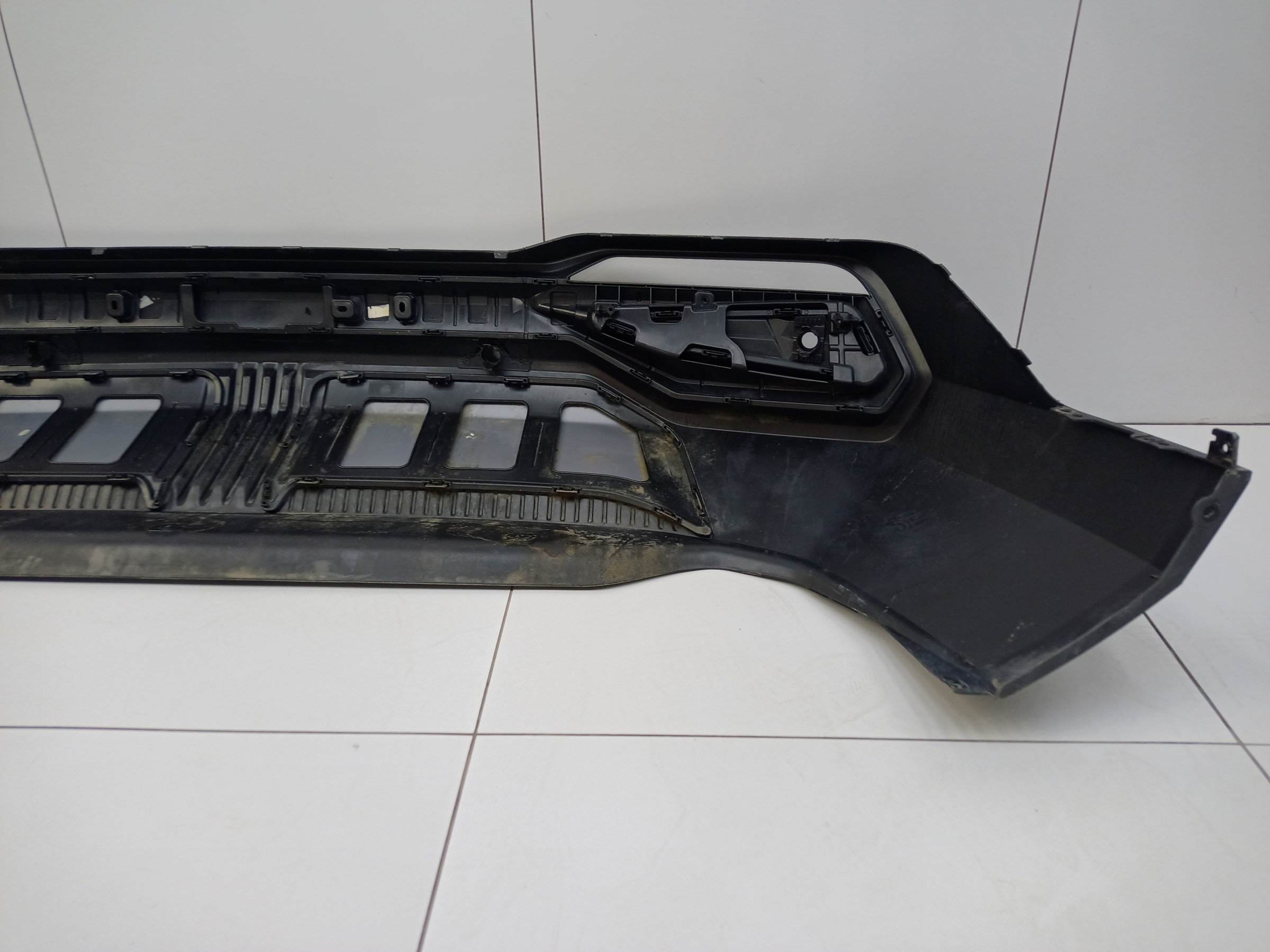 Юбка заднего бампера Geely Atlas 2