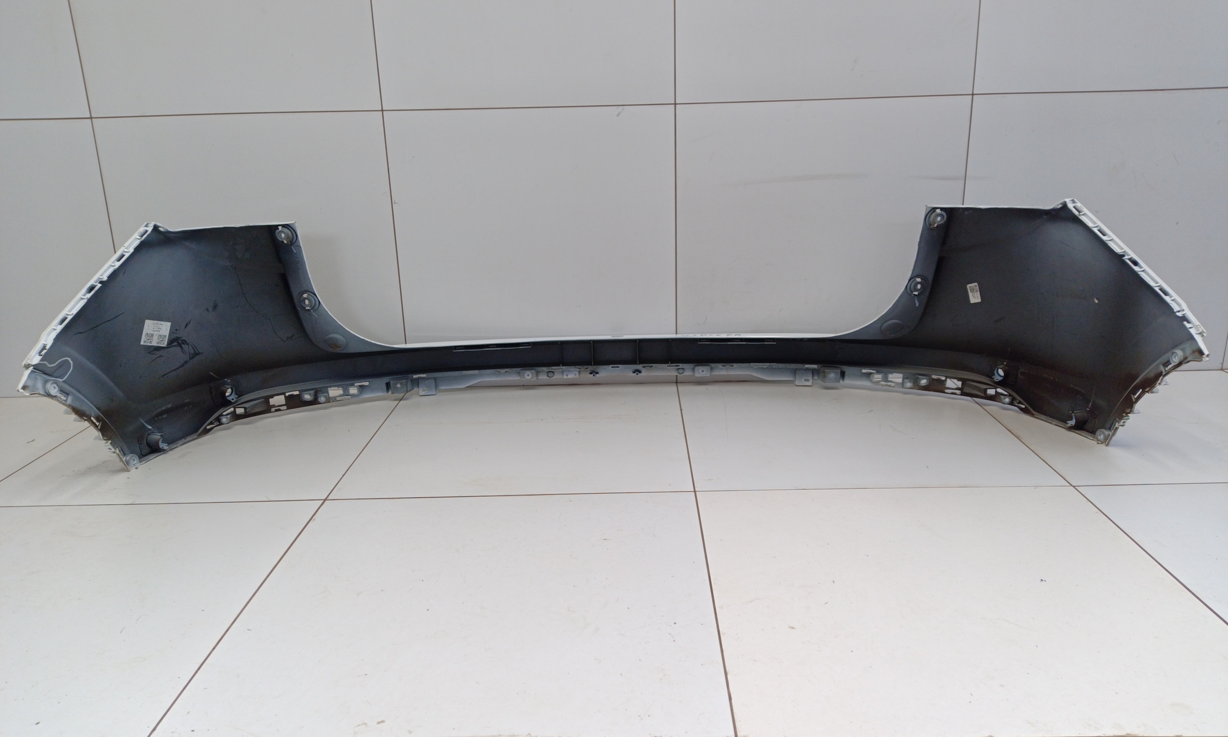 Бампер задний верхняя часть Geely Coolray