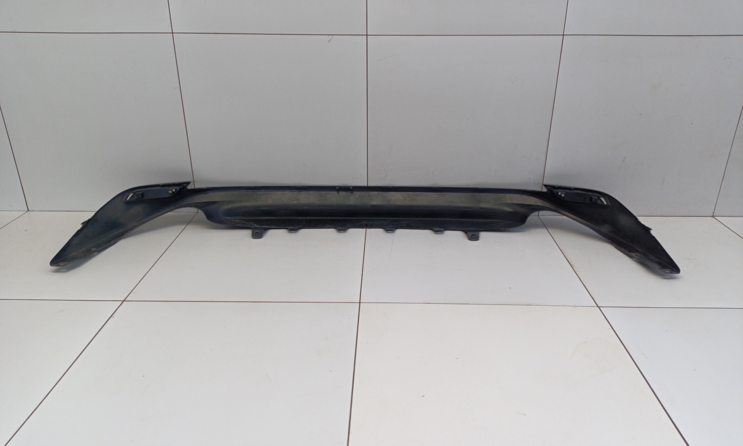 Юбка заднего бампера Toyota Camry V70