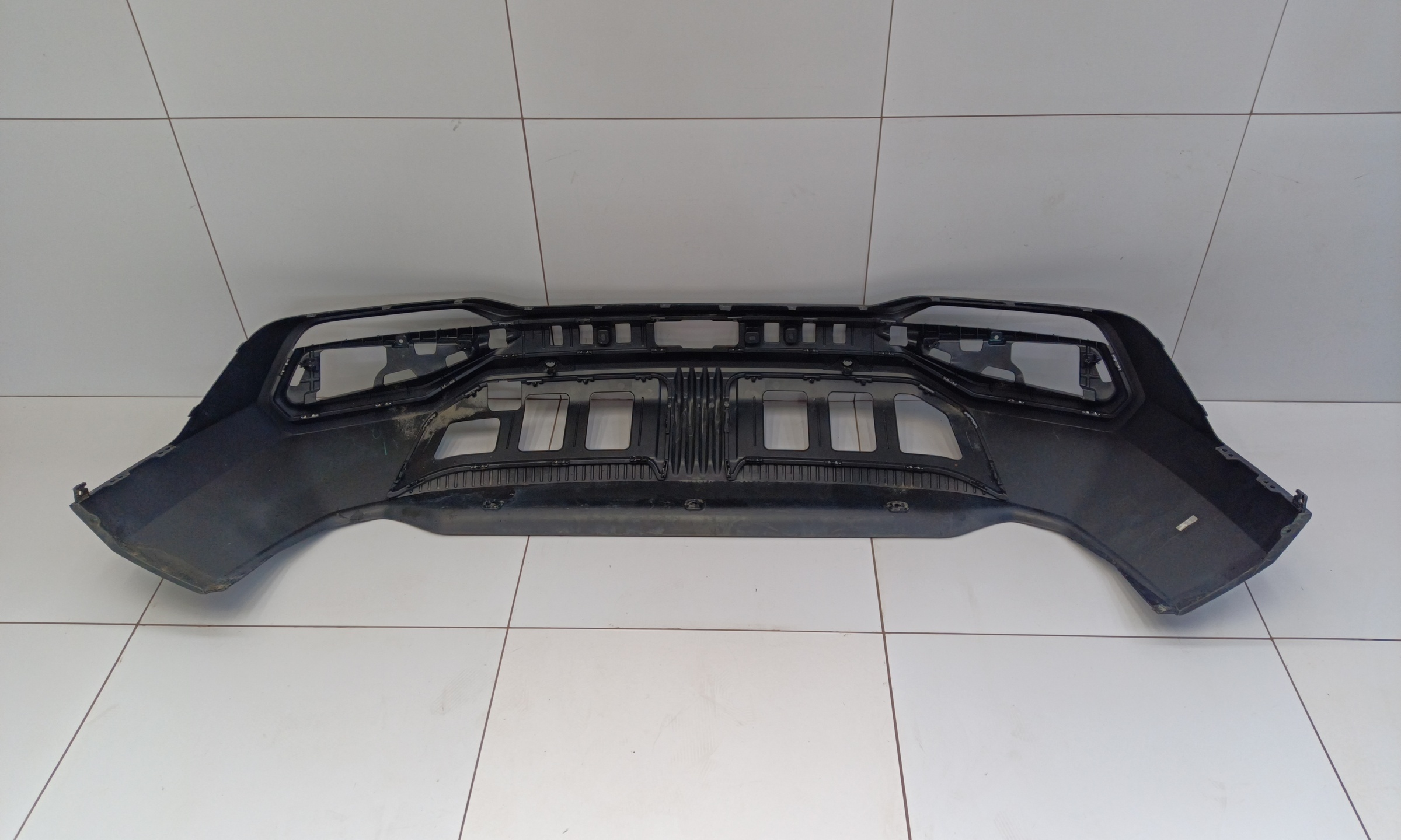 Юбка заднего бампера Geely Atlas 2