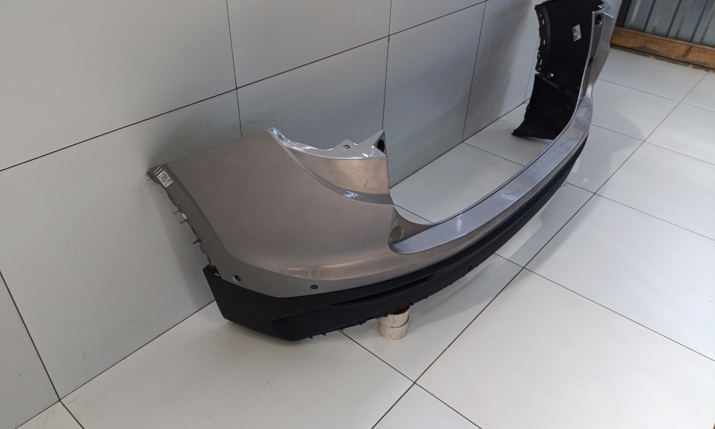 Бампер задний верхняя часть Geely Coolray