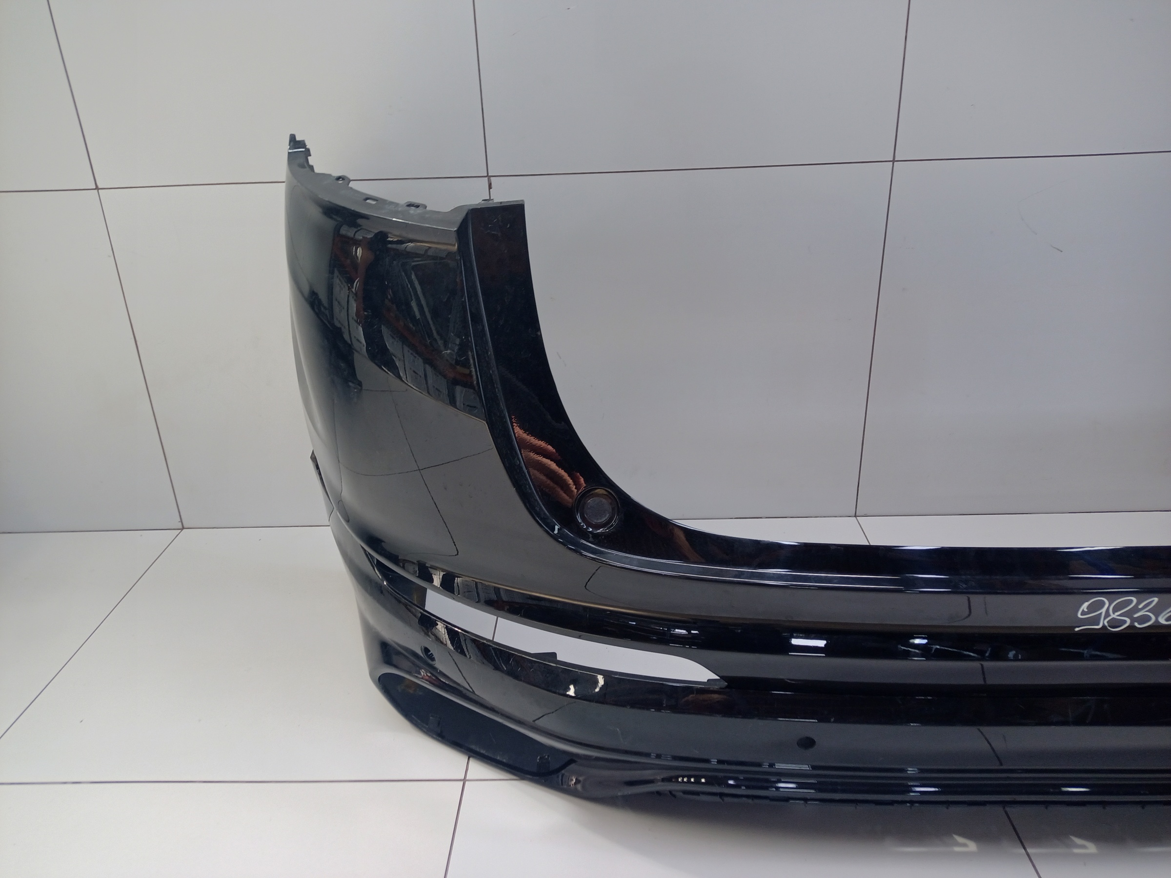 Бампер задний верхняя часть Geely Tugella