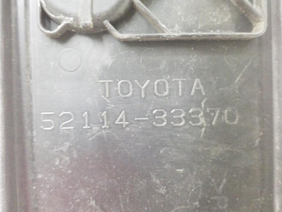 Накладка переднего бампера под номерной знак Toyota Camry V55