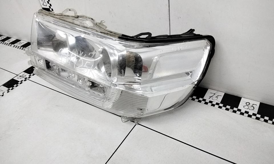 Стекло фары передней левой Toyota Land Cruiser 200 Restail 2